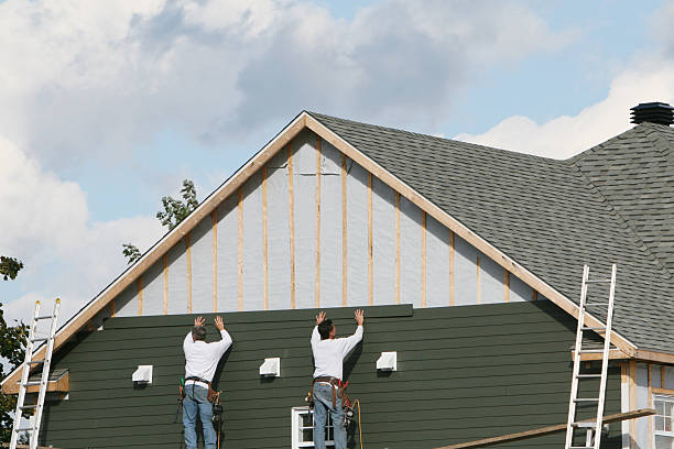 Professional Siding technician working in Madison, CT